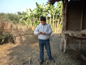 Field Assistant Mr. Khemraj Adhikari conducting household questionnaire survey.