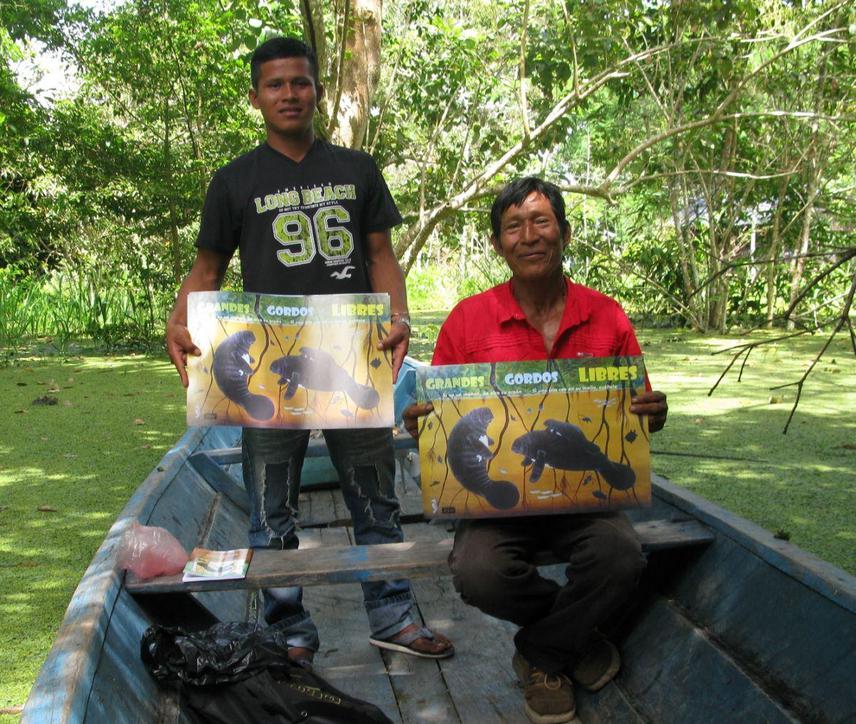 Fisherman with information posters.