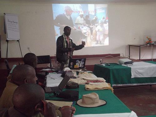 Bakari showing a presentation.