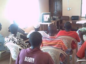 Stakeholders watching a video on crop-raiding.