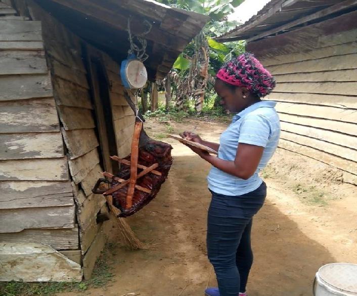 Manka’a Grace Niba recording bushmeat data.