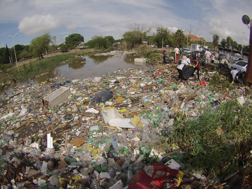 Extremely high concentration of plastic pollution in the Antoñico urban creek, close to the Paraná River confluence.