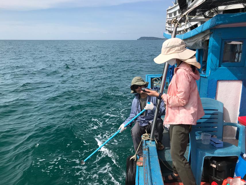 Wanlop and Chanikarn were collecting water samples from Gulf of Trat, Thailand. Irrawaddy dolphins (Orcaella brevirostris) were recently sighted from the sampling site. © Chinathip Tosamritkun.