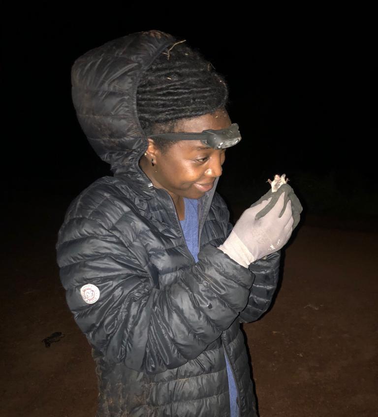 Aicha proud of the first bat of the night.