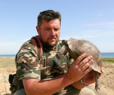 The coordinator of the project, Dr. Mark Pestov with very large individual of Mediterranean spur-thighed tortoise