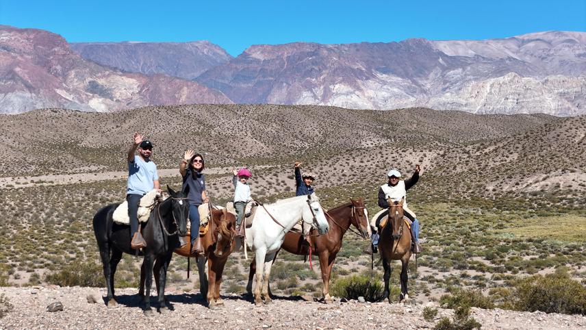 Horseback riding with a ranching family in Uspallata as part of the National Park creation project. ©Natura Argentina.